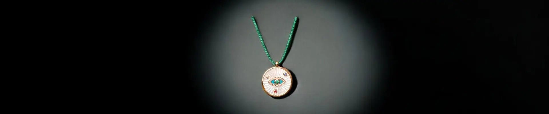 Elegant modern pendant featuring a unique design and green cord, perfect for any stylish occasion.