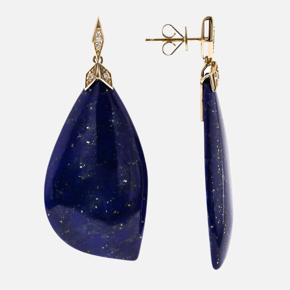 Teardrop-shaped blue gemstone earrings with gold accents on a white background