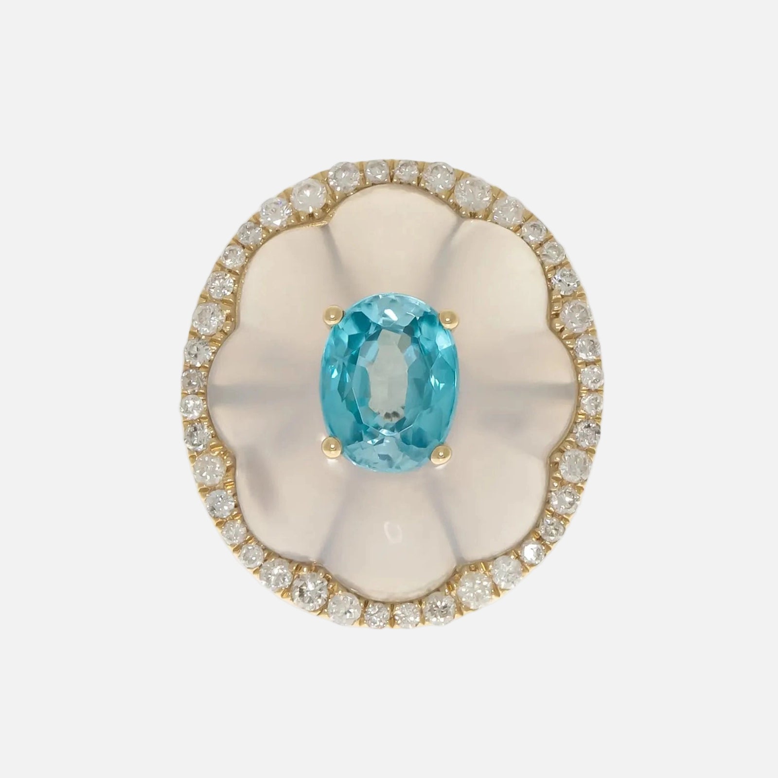 Jewelry with a blue gemstone and diamond accents on a white background