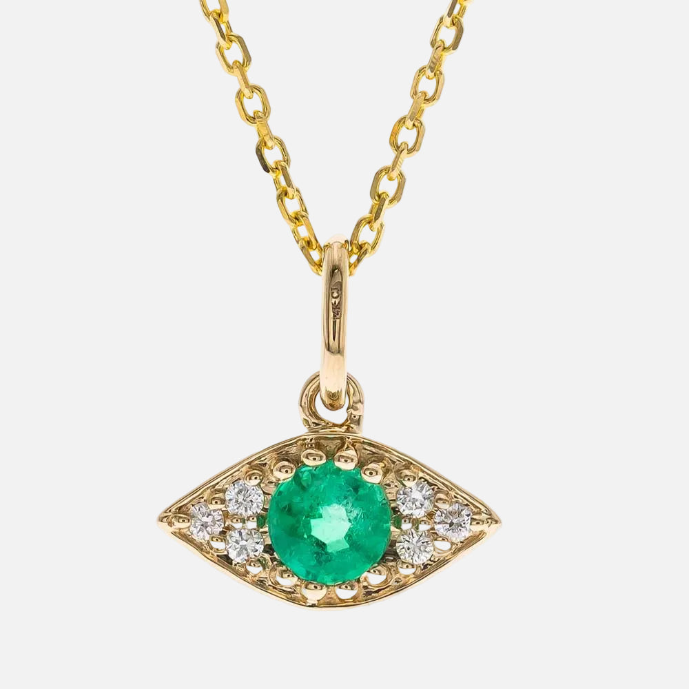 Emerald Evil Eye Pendant with Diamond Accents, a stunning green eye necklace in 14K yellow gold.