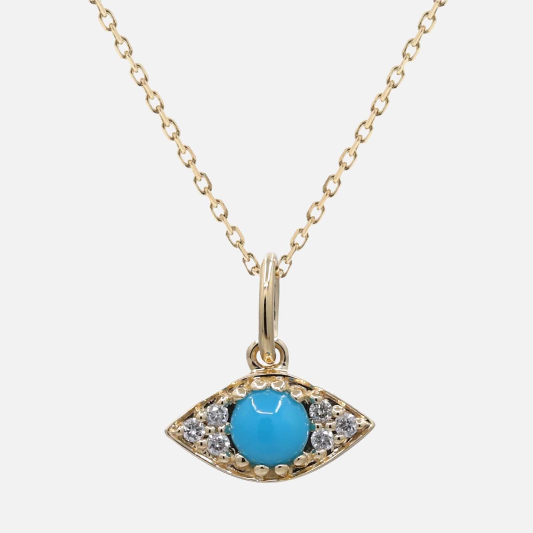 Gold necklace with a turquoise eye-shaped pendant