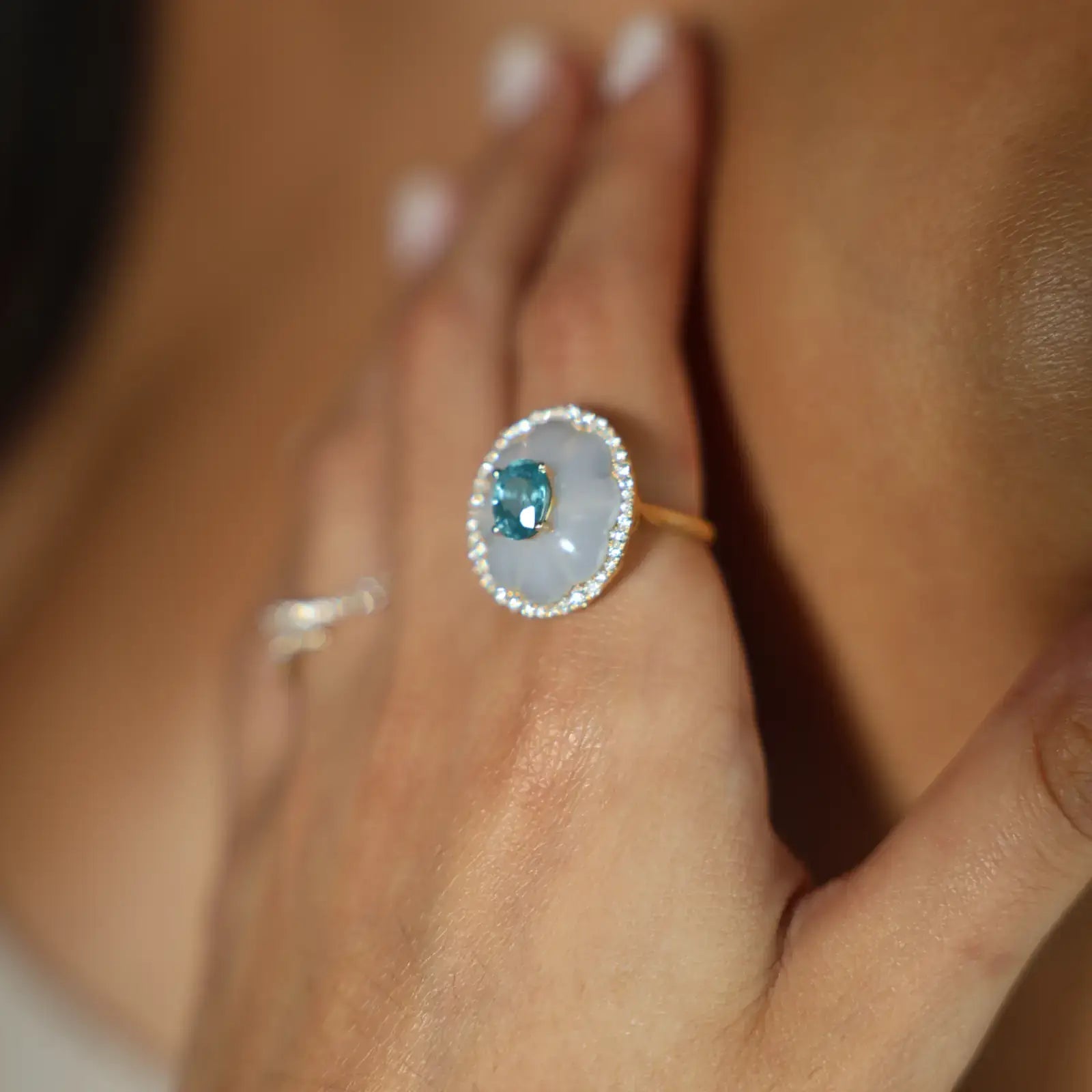 Close-up of a hand wearing a Natural Zircon Diamond Ring