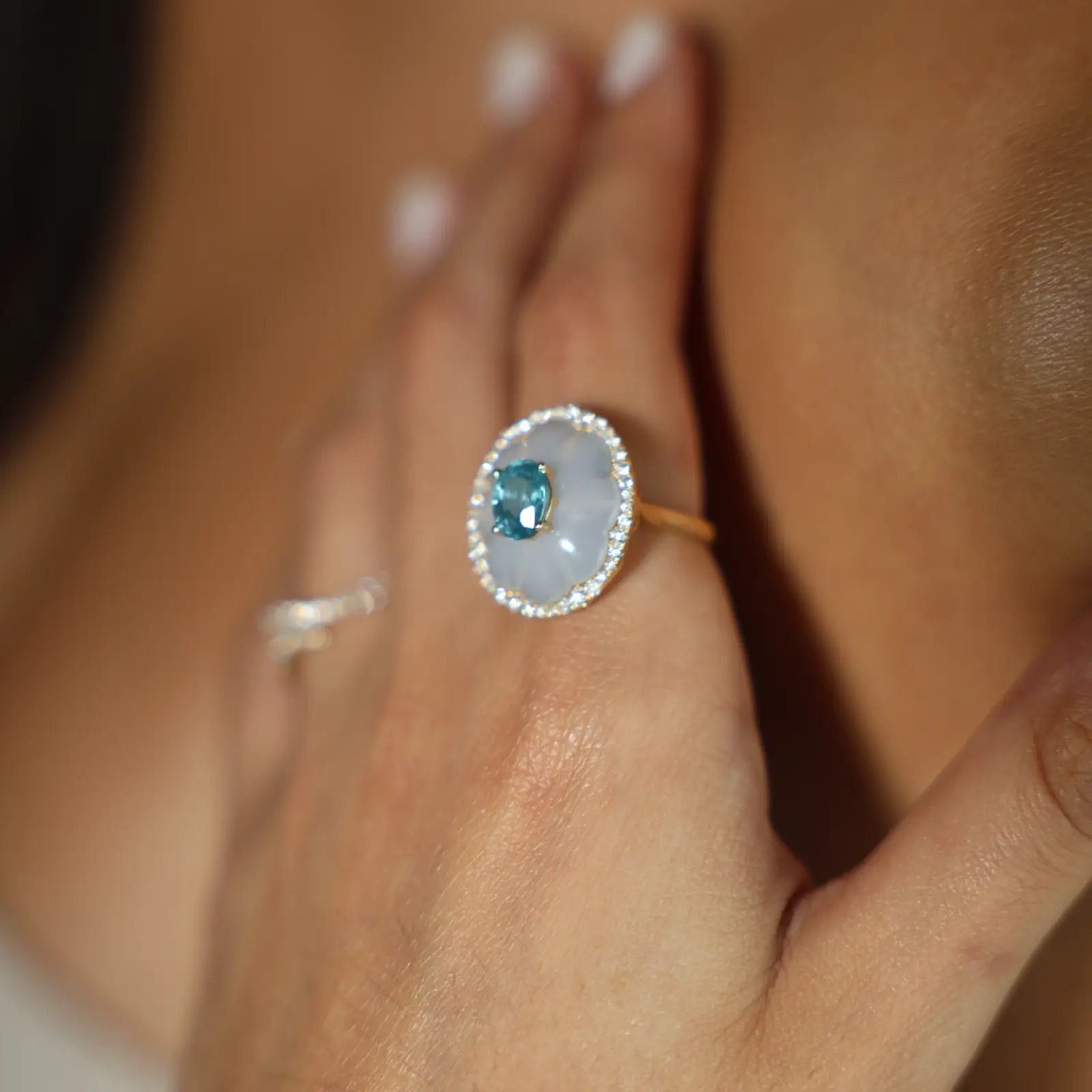 Close-up of a hand wearing a Natural Zircon Diamond Ring