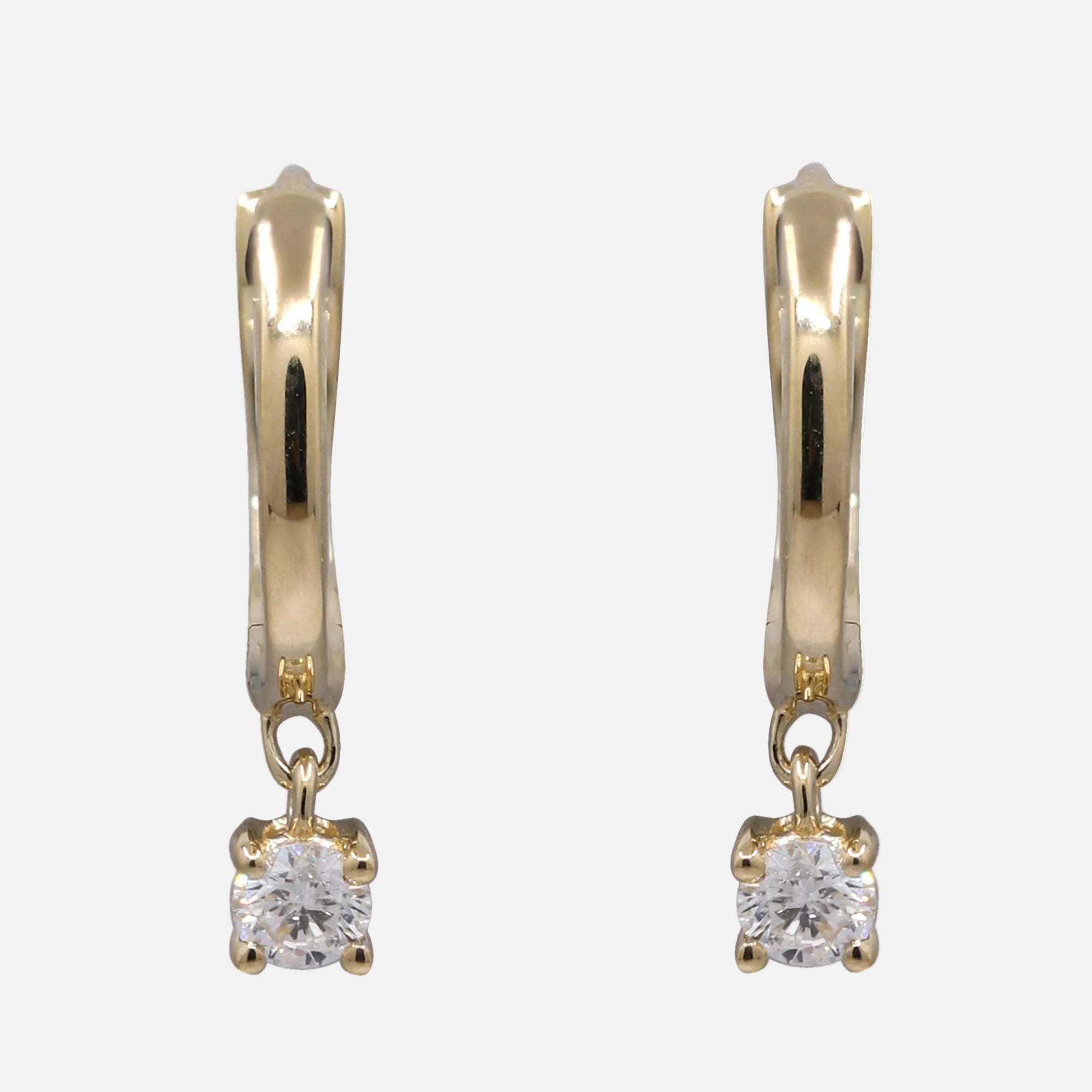 Diamond Drop Huggie Earrings in 14K Yellow Gold featuring dangling round brilliant diamonds.