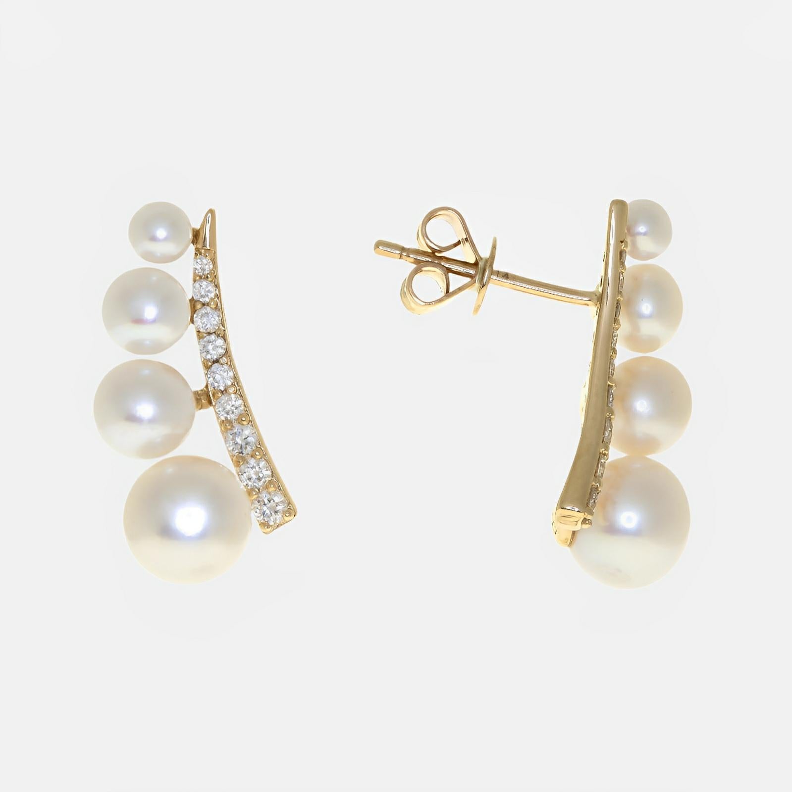 Sophisticated Pearl and Diamond Climber Earrings.