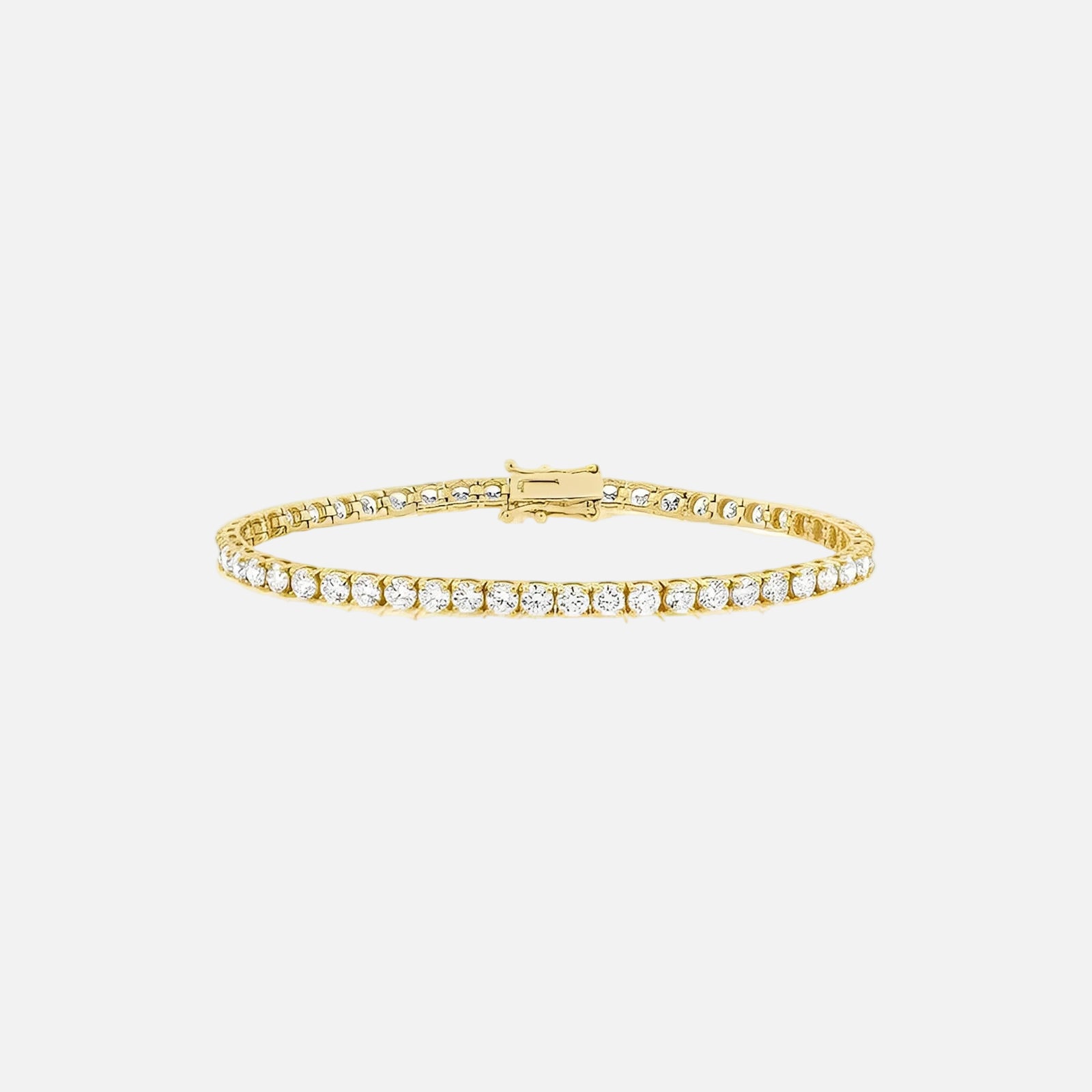 Gold bracelet with clear stones on a white background