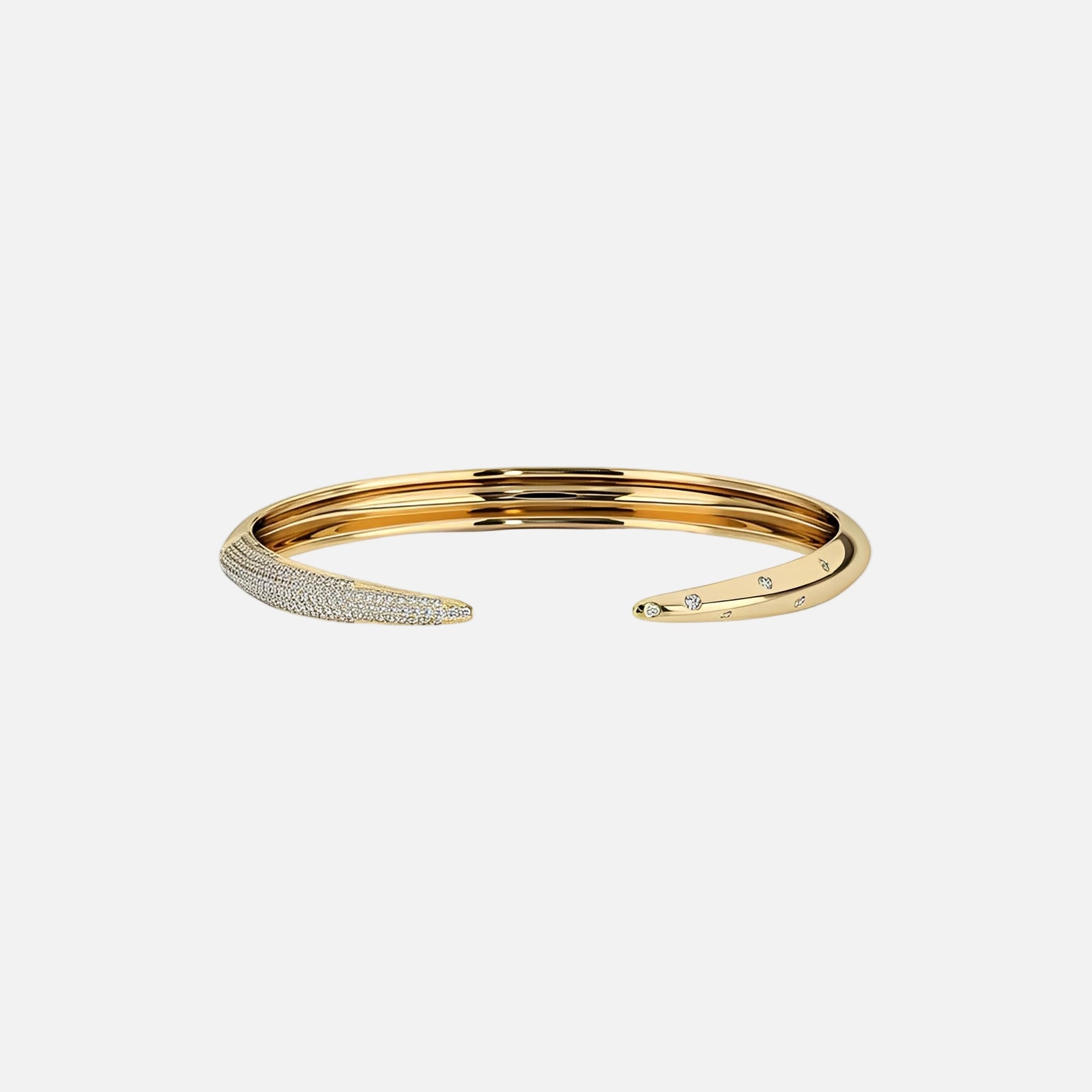 Gold bracelet with diamond accents on a white background