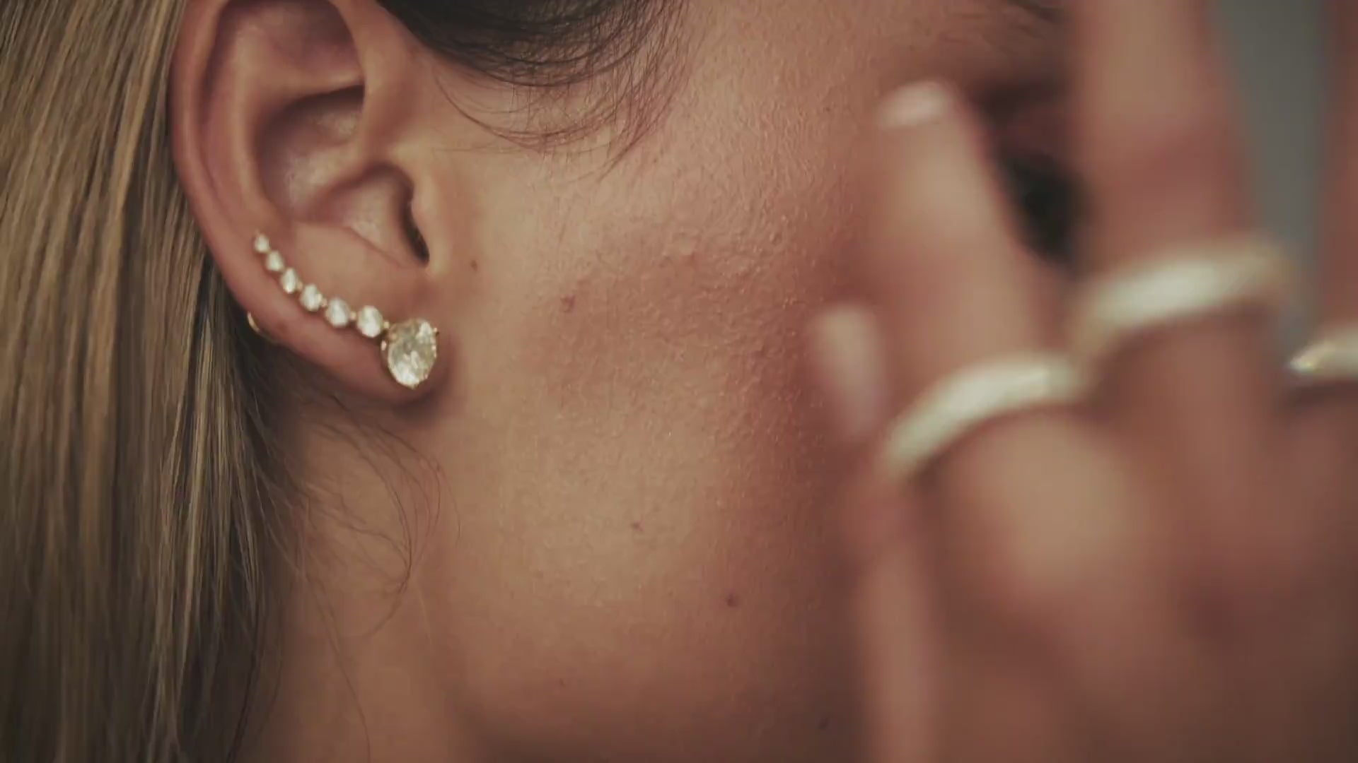 A Woman Wearing Koru Jewelers