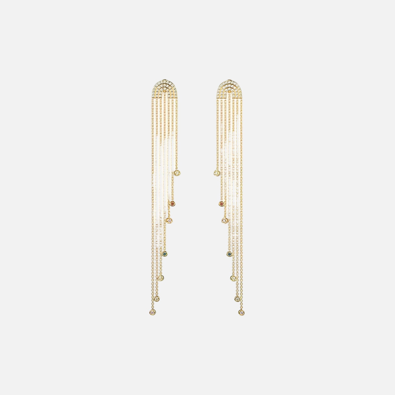 Gold chain earrings on a white background